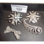 Four silver and diamante brooches