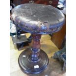 Victorian mahogany revolving piano stool with leather upholstered seat