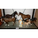 Four Beswick china horses, an owl and another horse