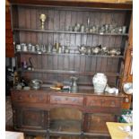 18th c. oak pot dresser with three drawers having original brass drop handles and later additions