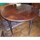 Georgian mahogany pad foot oval drop leaf dining table