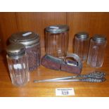 Silver napkin ring in leather case, five silver lidded glass jars and two button hooks