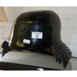 Japanese Samurai-type steel helmet in black lacquer with separate steel neck plates attached by