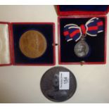 Two 1902 Coronation medallions cased, and a Victorian Jubilee medallion