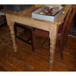 Victorian stripped pine kitchen table on turned legs, 51" long x 31" wide