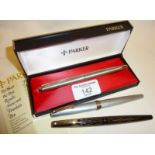 Vintage Parker fountain pen in case with brushed steel finish. Together with two Sheaffer fountain