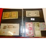 Good quantity of banknotes in an album
