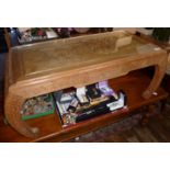Oriental carved hardwood coffee table with drawer and glass top