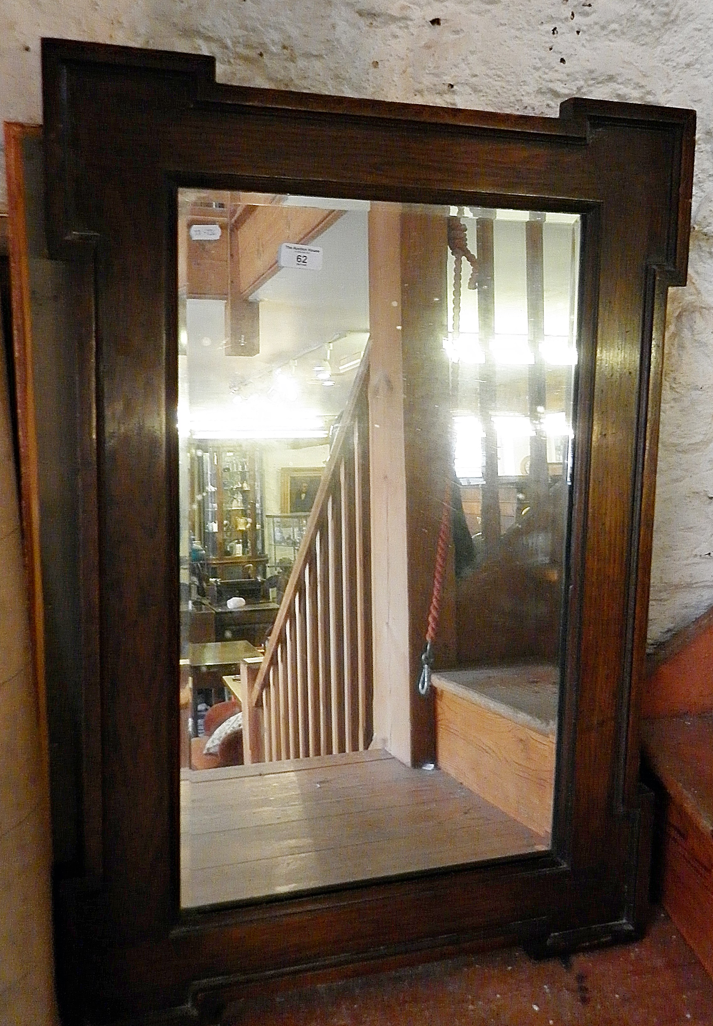 Wall mirror with shaped oak frame