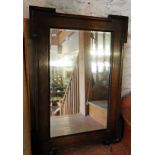 Wall mirror with shaped oak frame