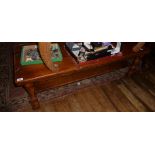 Rustic wood coffee table on turned legs with undertier, 52"! long
