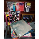 Assorted vinyl pop LPs & singles, and a framed filmcell of the Rolling Stones