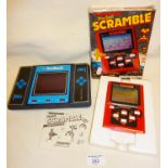 1980's handheld electronic video games - a boxed Grandstand Pocket Scramble (working), and an