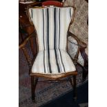 Art Nouveau stained beech elbow chair with upholstered seat and back