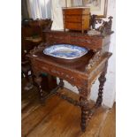 Victorian carved oak bonheur du jour with single drawer and having carved gallery and drawers to top