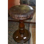 Victorian mahogany revolving piano stool with leather upholstered seat