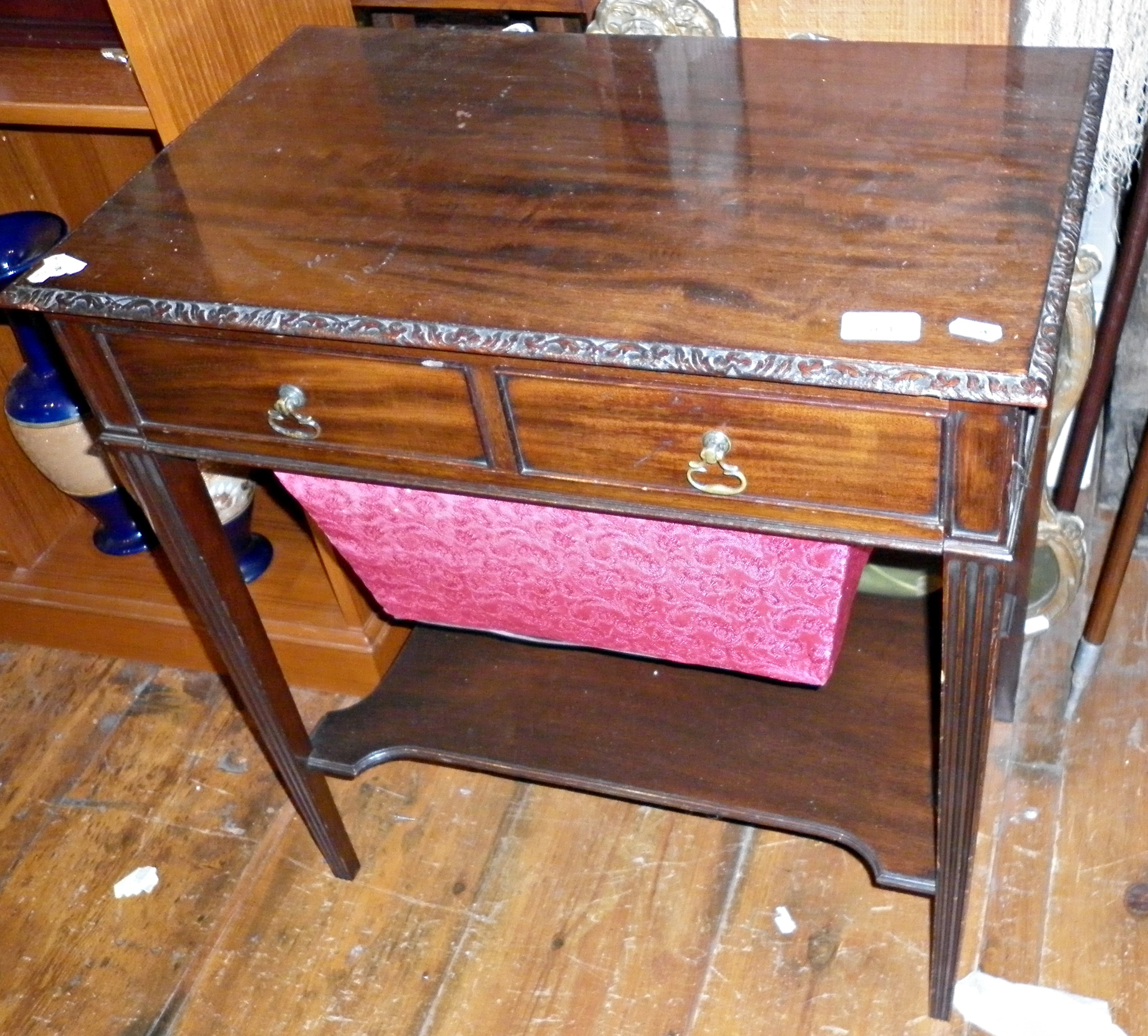 Edwardian mahogany sewing table with two drawers on fluted square legs