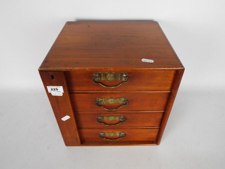 A small four drawer chest / collectors cabinet measuring approximately 31 cm x 30 cm x 26 cm. - Image 2 of 5