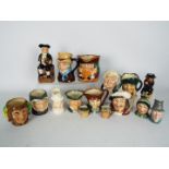 A collection of character jugs and Toby jugs including eight Royal Doulton examples,