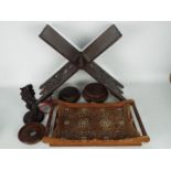 A carved folding book rest with inlaid decoration, carved tray, Oriental stands and similar.