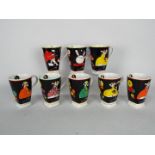 Eight limited edition Wedgwood Clarice Cliff, The Age Of Jazz mugs.