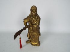 Chinese cast metal figure depicting the warrior Guan Yu, approximately 26 cm (h).