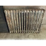 A Victorian, four bar, cast iron radiator,