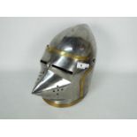 A reproduction, brass mounted hounskull or pig faced bascinet,