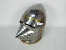 A reproduction, brass mounted hounskull or pig faced bascinet,