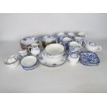 A collection of blue and white china to include Wedgwood tea wares decorated with prunus and