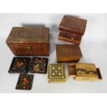 A collection of various trinket boxes, small camphor wood chest and similar.