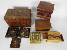 A collection of various trinket boxes, small camphor wood chest and similar.