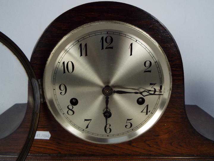 A mantel clock with key and pendulum and a small Art Deco Elliot clock. - Image 2 of 5