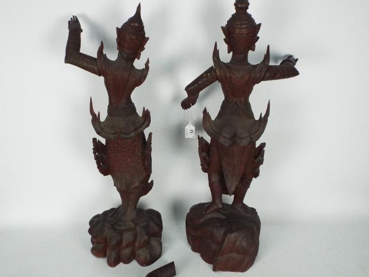 A large pair of South East Asian carved wood figures of female dancers, - Image 7 of 7