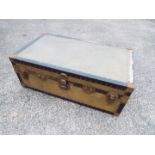 A vintage metal bound trunk by Watajoy, London, approximately 34 cm x 92 cm x 53 cm.