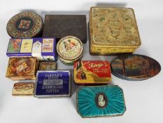 A collection of vintage biscuit and other tins to include Huntley & Palmers, Carr & Co,