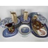 A quantity of ceramics, predominantly blue and white to include meat plates, serving dishes,