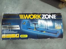 A boxed Work Zone 400W Wood Turning Lathe, appears factory sealed.