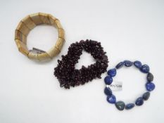 A 146.40ct Lapis Lazuli and Sterling Silver Stretchable Bracelet (Does not include pouch), a 352.