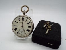 A Victorian silver cased pocket watch, marked Improved Patent to the enamel dial,