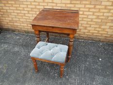 A school desk with hinged lid, approximately 87 cm x 77 cm x 68 cm and a stool.