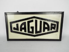 Illuminated light box 'Jaguar', approximately 26 cm x 50 cm x 10 cm.