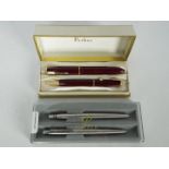 Parker - A vintage Parker Victory fountain pen and pencil set in red, the pen with 14k nib,