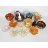 Carnival Glass - A small selection of carnival glass to include a marigold footed rose bowl,
