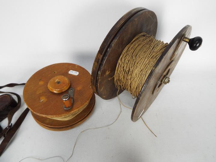 Two vintage wooden kite reels, largest approximately 23.5 cm (d) and two cameras. - Image 4 of 4