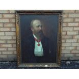 A framed oil on canvas portrait of a gentleman, approximately 81 cm x 61 cm.