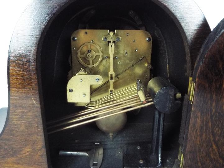A mantel clock with key and pendulum and a small Art Deco Elliot clock. - Image 3 of 5