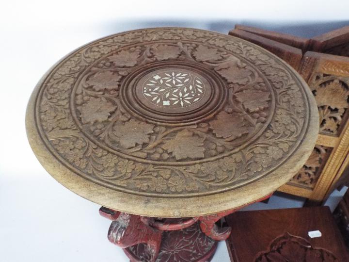 A folding table with carved decoration, 41 cm (h), a cinnabar lacquer style stand, - Image 3 of 7
