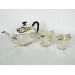 A silver tea set comprising teapot, cream jug and sugar bowl, Sheffield assay 1939 / 1940,