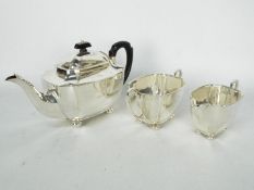 A silver tea set comprising teapot, cream jug and sugar bowl, Sheffield assay 1939 / 1940,